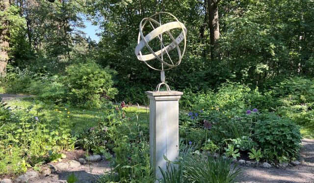 Photo of a garden sundial in the form of an armillary sphere in Skansen, Stockholm, Sweden.